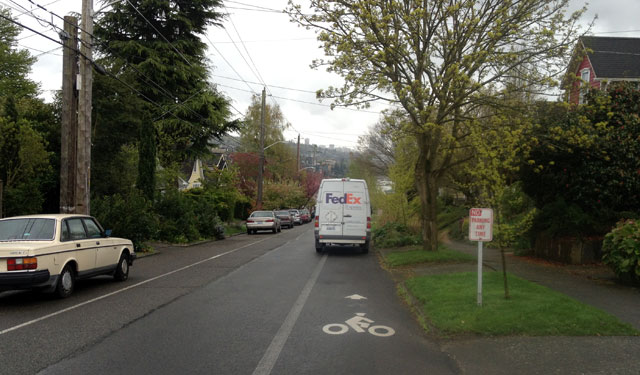 FedEx truck in the bike lane