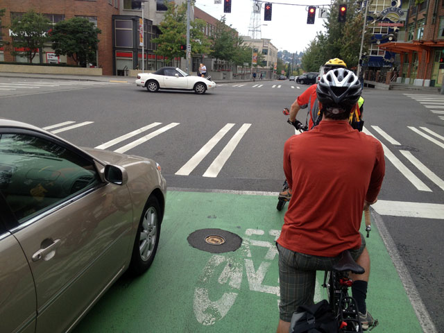 Car in the Fremont bike box