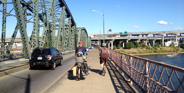 Riding over the Hawthorne Bridge with Dave and Katie