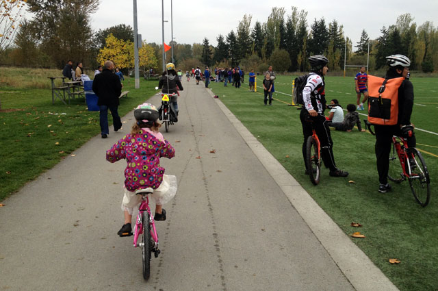 Birthday party bike parade through the park